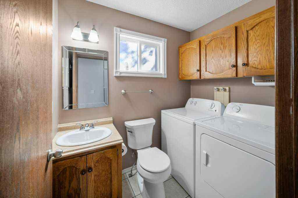 MLS® A2265065 - 108 Woodborough Crescent SW in Woodbine Calgary, Residential