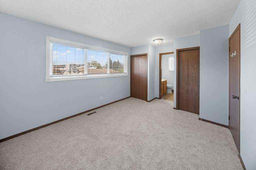 MLS® A2265065 - 108 Woodborough Crescent SW in Woodbine Calgary, Residential