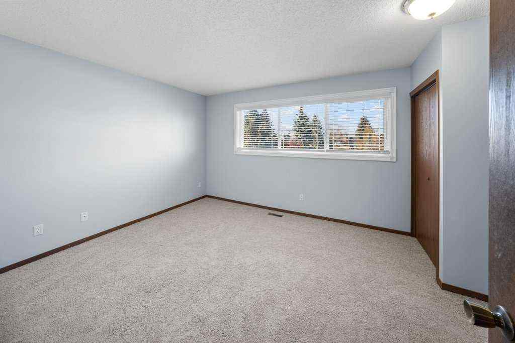 MLS® A2265065 - 108 Woodborough Crescent SW in Woodbine Calgary, Residential