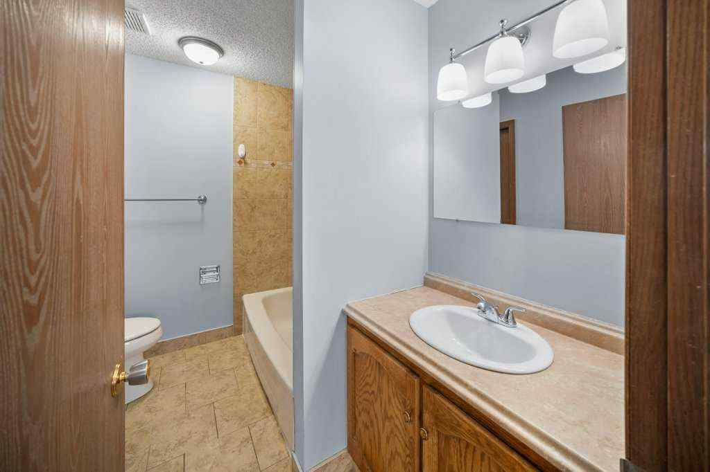 MLS® A2265065 - 108 Woodborough Crescent SW in Woodbine Calgary, Residential