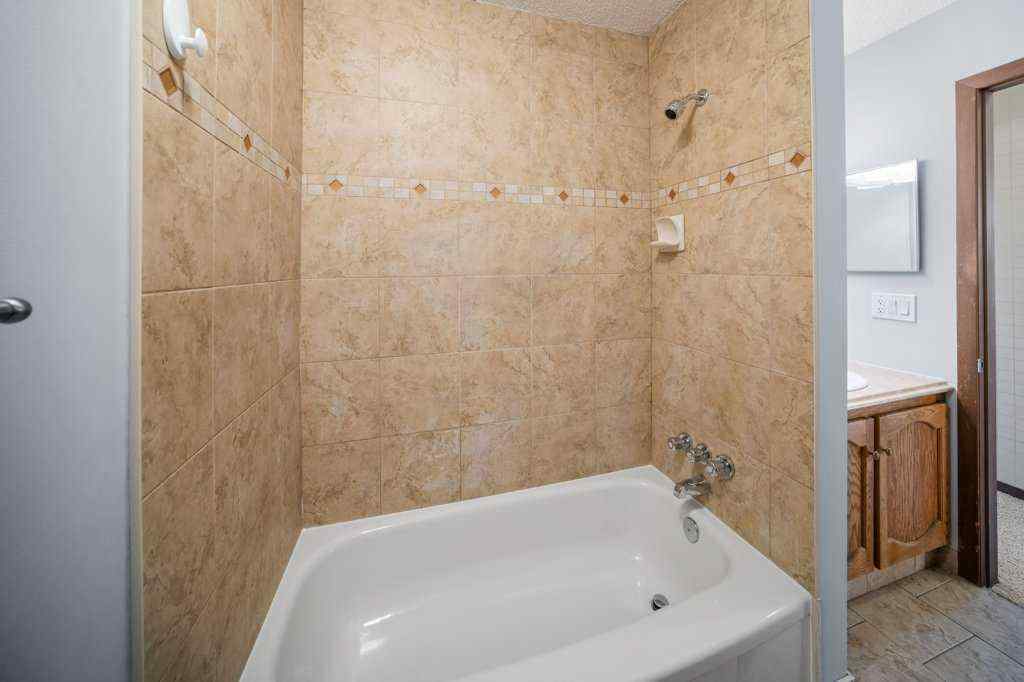 MLS® A2265065 - 108 Woodborough Crescent SW in Woodbine Calgary, Residential