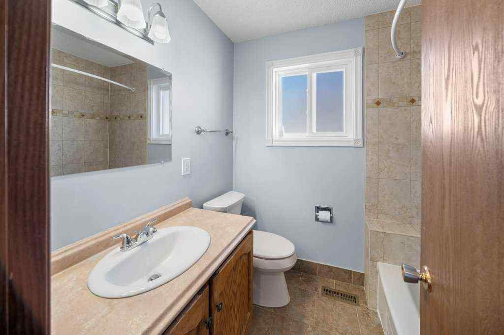 MLS® A2265065 - 108 Woodborough Crescent SW in Woodbine Calgary, Residential