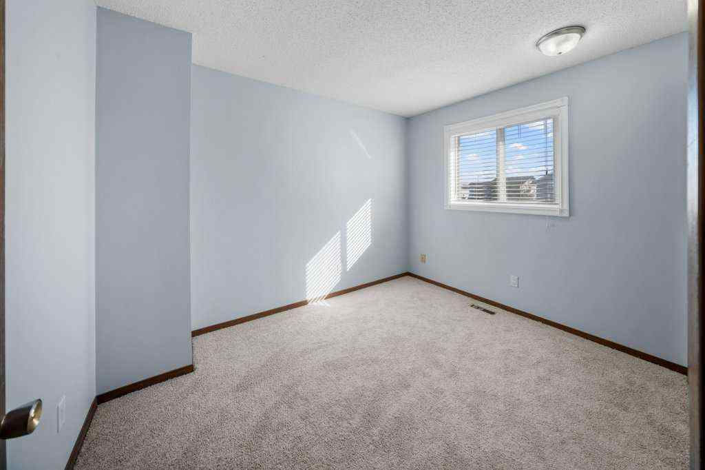 MLS® A2265065 - 108 Woodborough Crescent SW in Woodbine Calgary, Residential