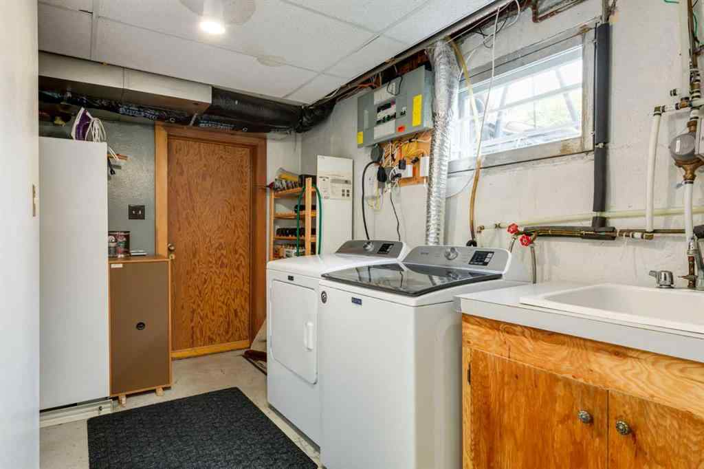 MLS® A2265066 - 48 Chancellor Way NW in Cambrian Heights Calgary, Residential