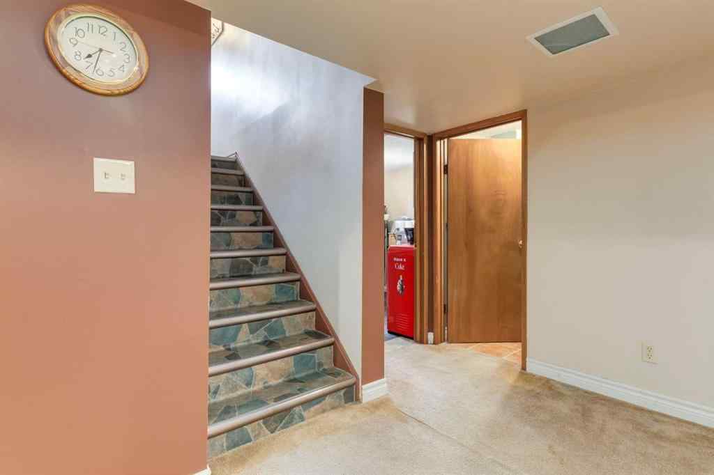 MLS® A2265066 - 48 Chancellor Way NW in Cambrian Heights Calgary, Residential