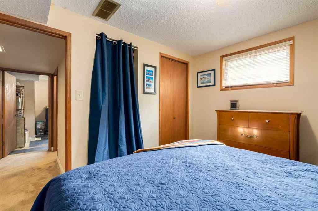 MLS® A2265066 - 48 Chancellor Way NW in Cambrian Heights Calgary, Residential