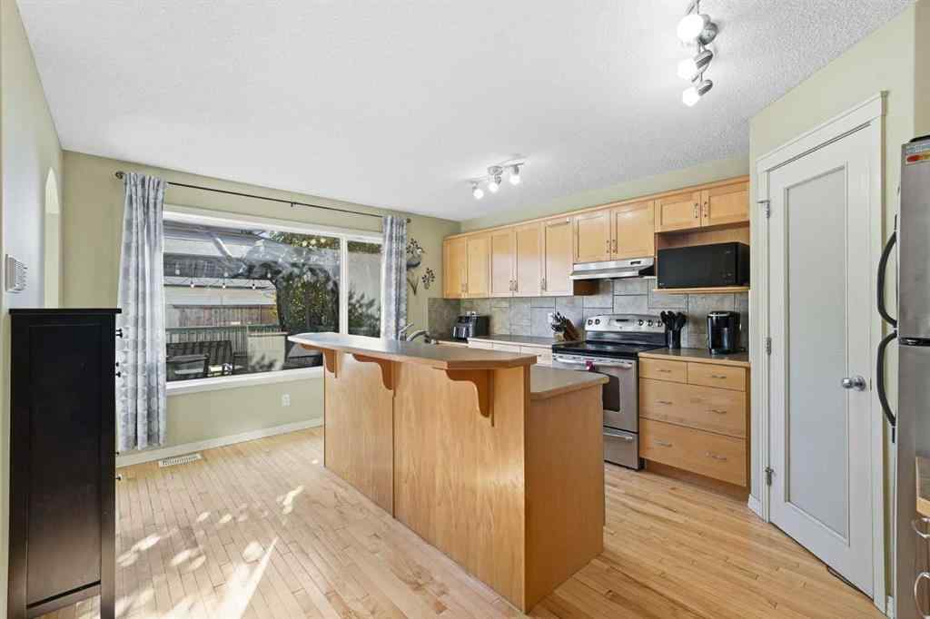 MLS® A2265076 - 23 Cramond Circle SE in Cranston Calgary, Residential