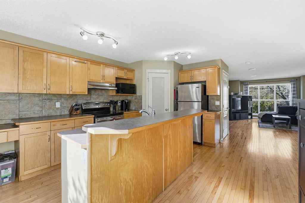 MLS® A2265076 - 23 Cramond Circle SE in Cranston Calgary, Residential