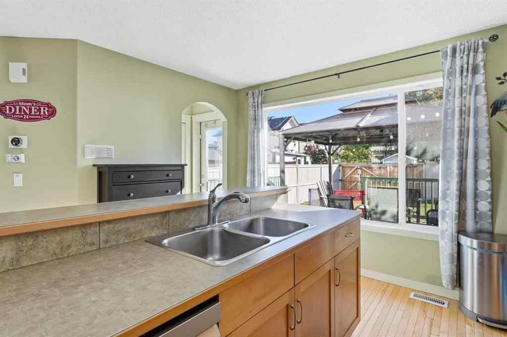 MLS® A2265076 - 23 Cramond Circle SE in Cranston Calgary, Residential