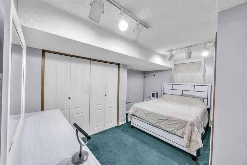 MLS® A2265078 - 303 Ranchridge Bay NW in Ranchlands Calgary, Residential