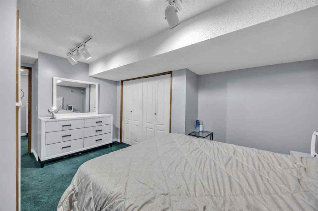 MLS® A2265078 - 303 Ranchridge Bay NW in Ranchlands Calgary, Residential