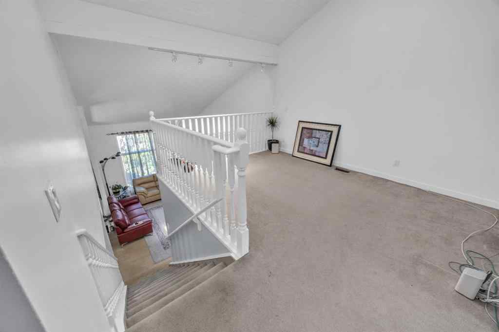 MLS® A2265078 - 303 Ranchridge Bay NW in Ranchlands Calgary, Residential