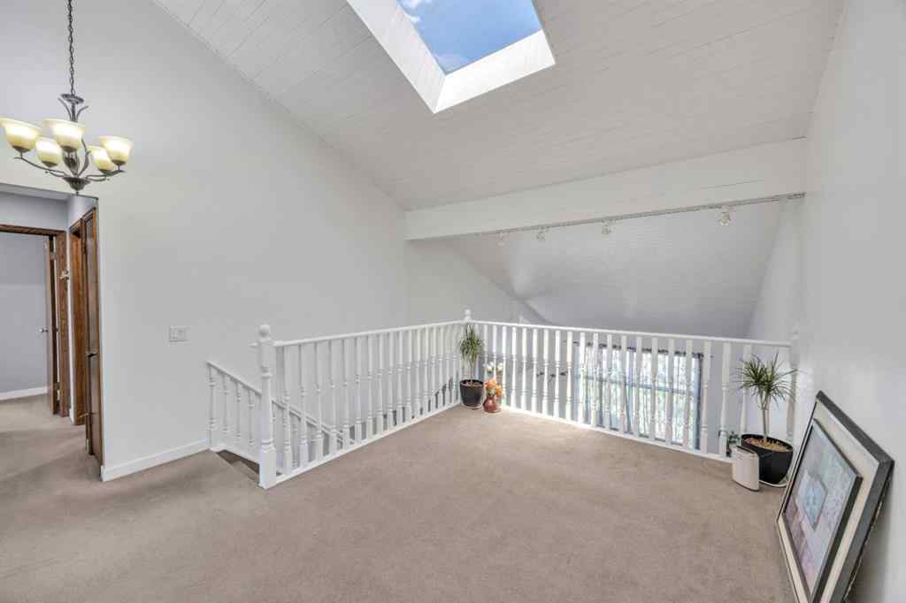 MLS® A2265078 - 303 Ranchridge Bay NW in Ranchlands Calgary, Residential