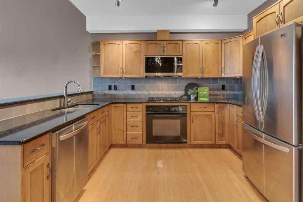 MLS® A2265086 - Unit #407 3412 Parkdale Boulevard NW in Parkdale Calgary, Residential