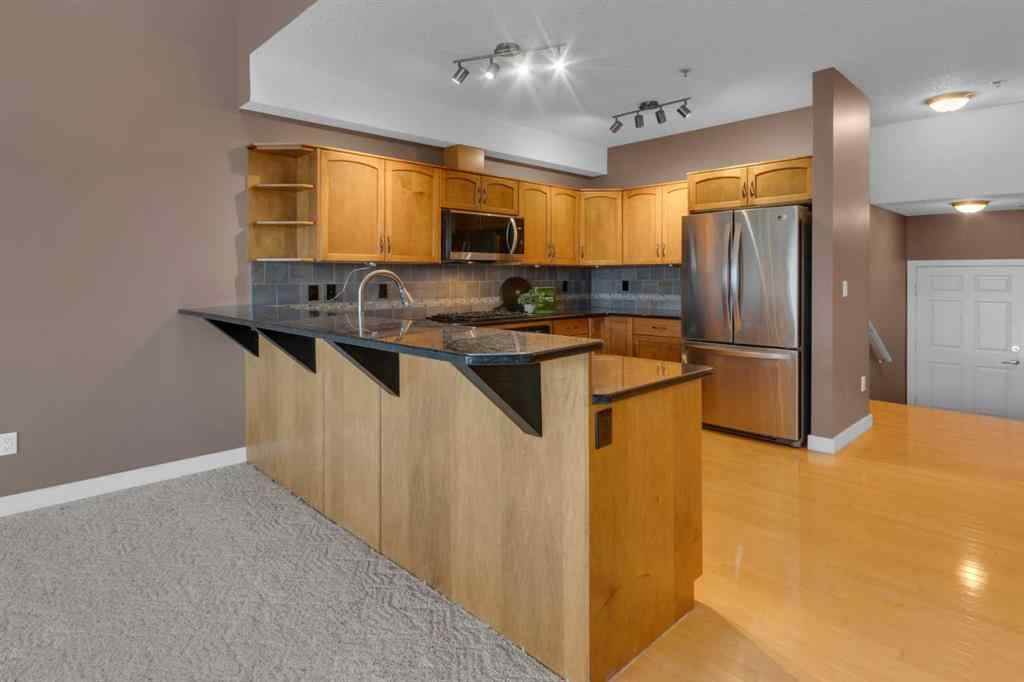 MLS® A2265086 - Unit #407 3412 Parkdale Boulevard NW in Parkdale Calgary, Residential