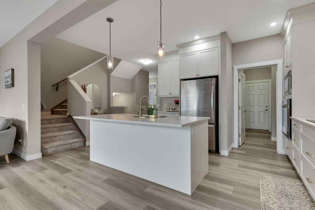 MLS® A2265104 - 216 Creekstone Row SW in Pine Creek Calgary, Residential