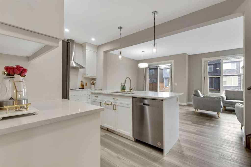 MLS® A2265104 - 216 Creekstone Row SW in Pine Creek Calgary, Residential