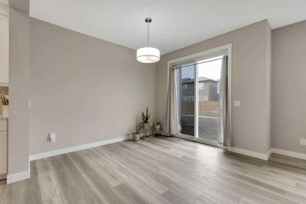 MLS® A2265104 - 216 Creekstone Row SW in Pine Creek Calgary, Residential