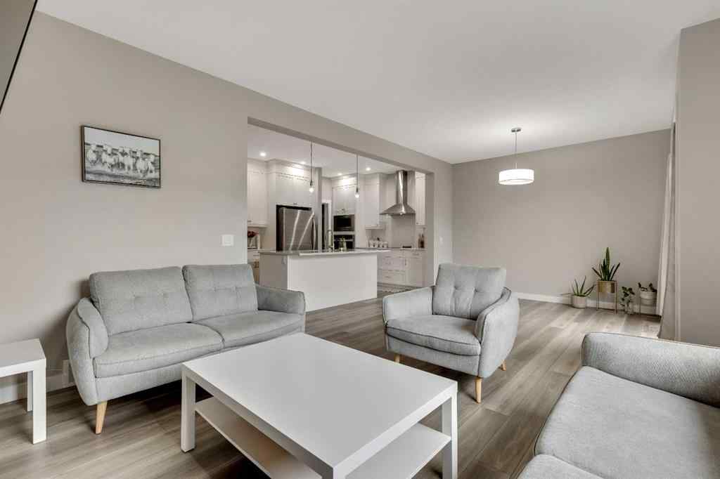 MLS® A2265104 - 216 Creekstone Row SW in Pine Creek Calgary, Residential