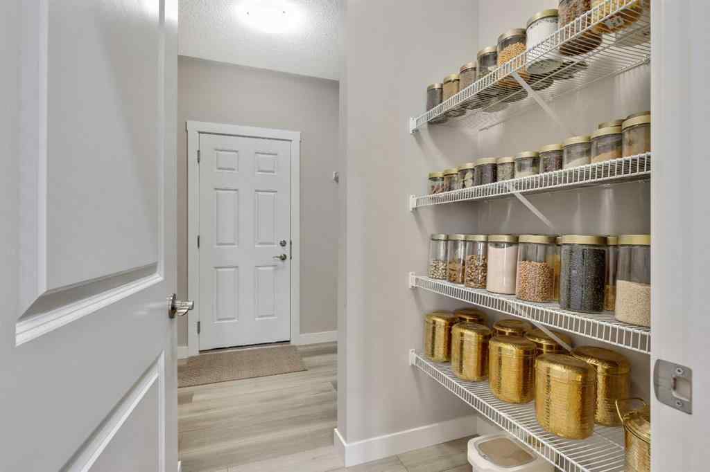 MLS® A2265104 - 216 Creekstone Row SW in Pine Creek Calgary, Residential