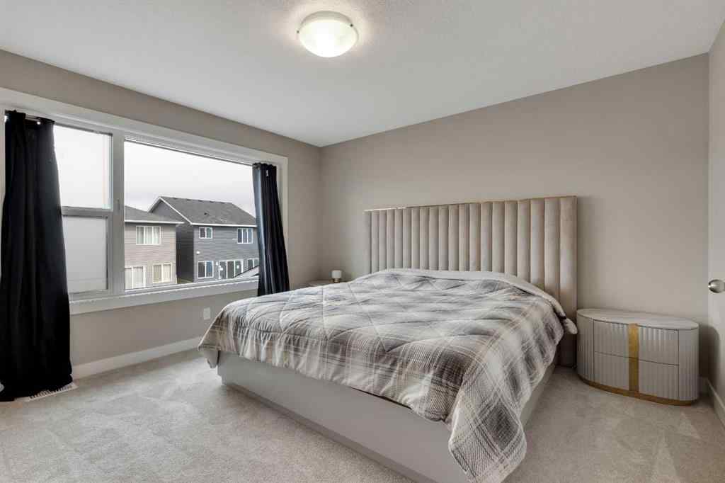 MLS® A2265104 - 216 Creekstone Row SW in Pine Creek Calgary, Residential