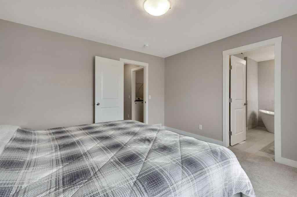 MLS® A2265104 - 216 Creekstone Row SW in Pine Creek Calgary, Residential