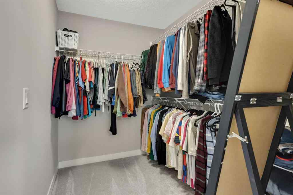 MLS® A2265104 - 216 Creekstone Row SW in Pine Creek Calgary, Residential