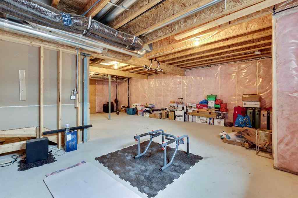 MLS® A2265104 - 216 Creekstone Row SW in Pine Creek Calgary, Residential