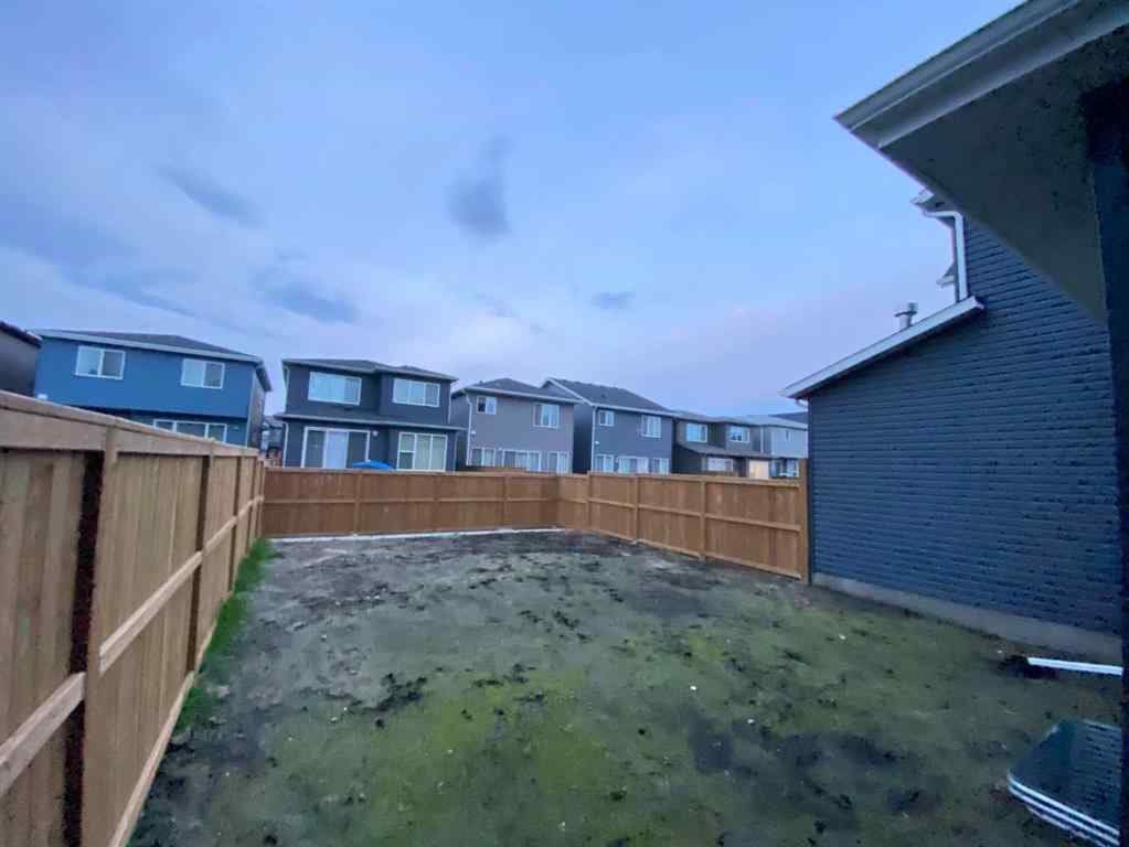 MLS® A2265104 - 216 Creekstone Row SW in Pine Creek Calgary, Residential