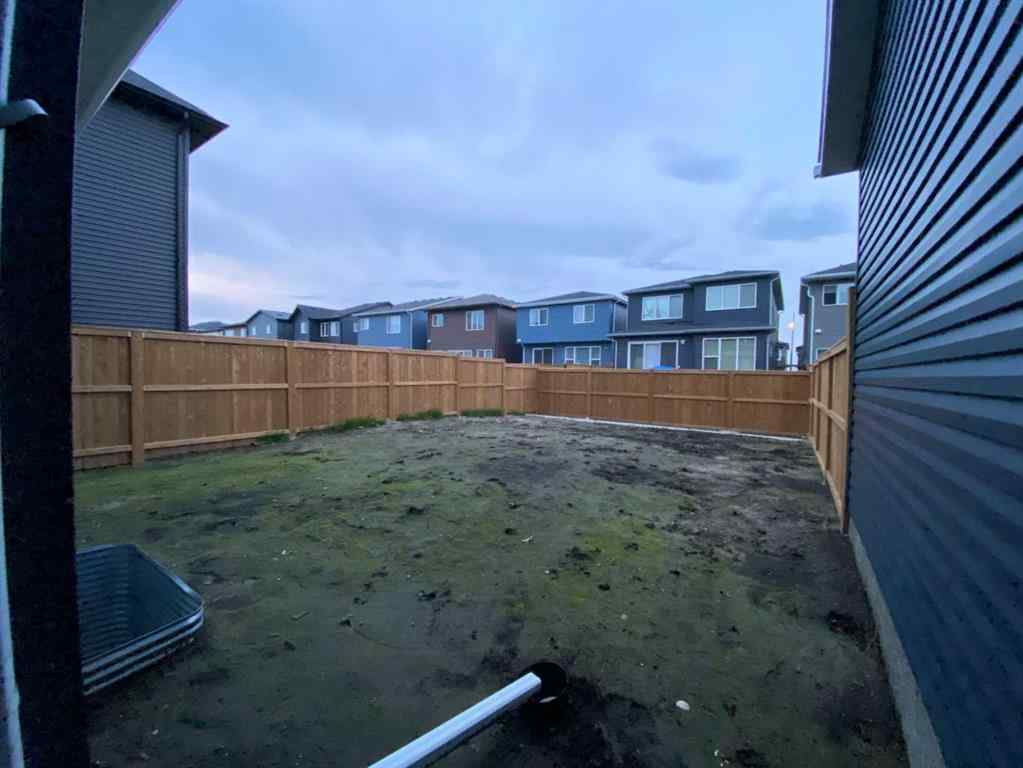 MLS® A2265104 - 216 Creekstone Row SW in Pine Creek Calgary, Residential