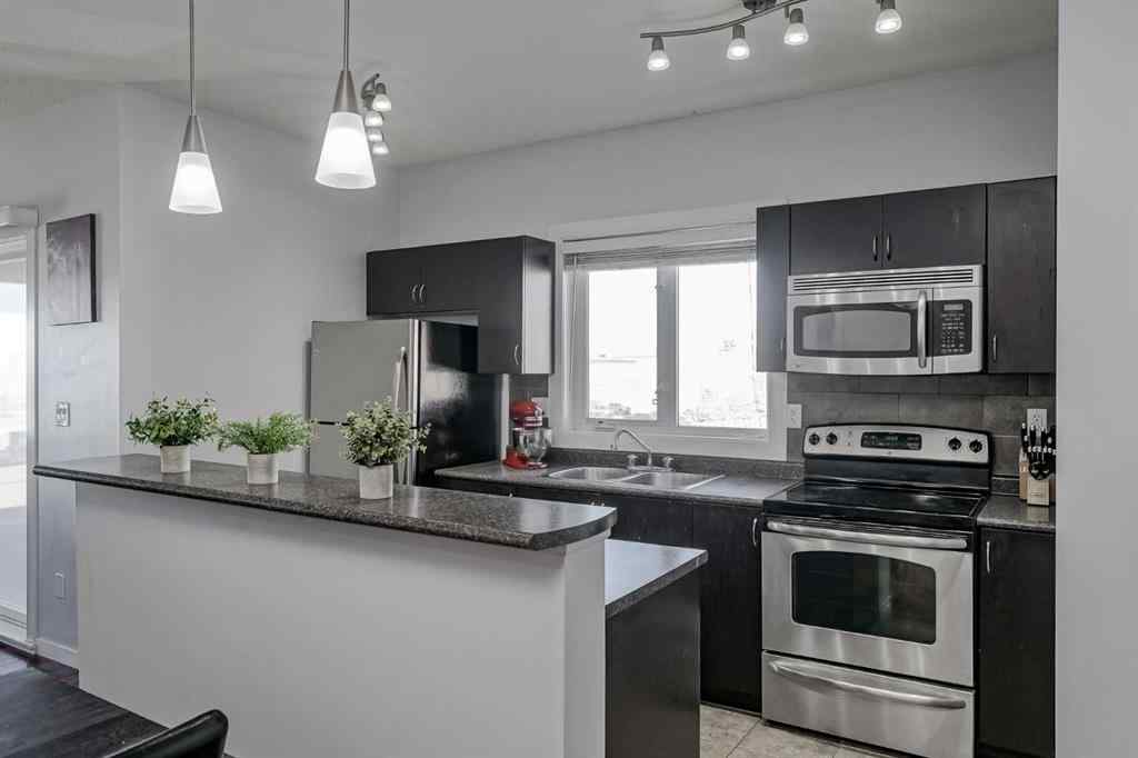 MLS® A2265105 - Unit #1318 604 East Lake Boulevard NE in East Lake Industrial Airdrie, Residential