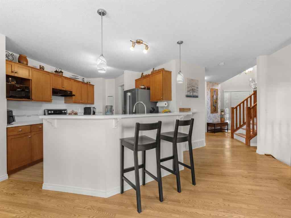 MLS® A2265108 - 97 Evansbrooke Way NW in Evanston Calgary, Residential