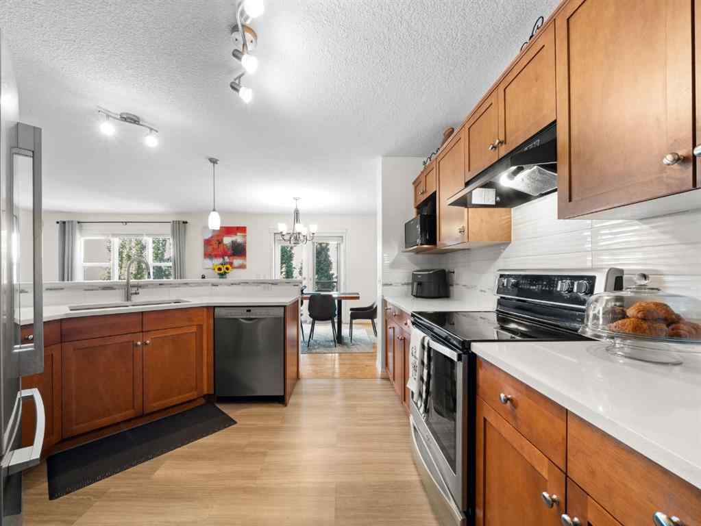 MLS® A2265108 - 97 Evansbrooke Way NW in Evanston Calgary, Residential