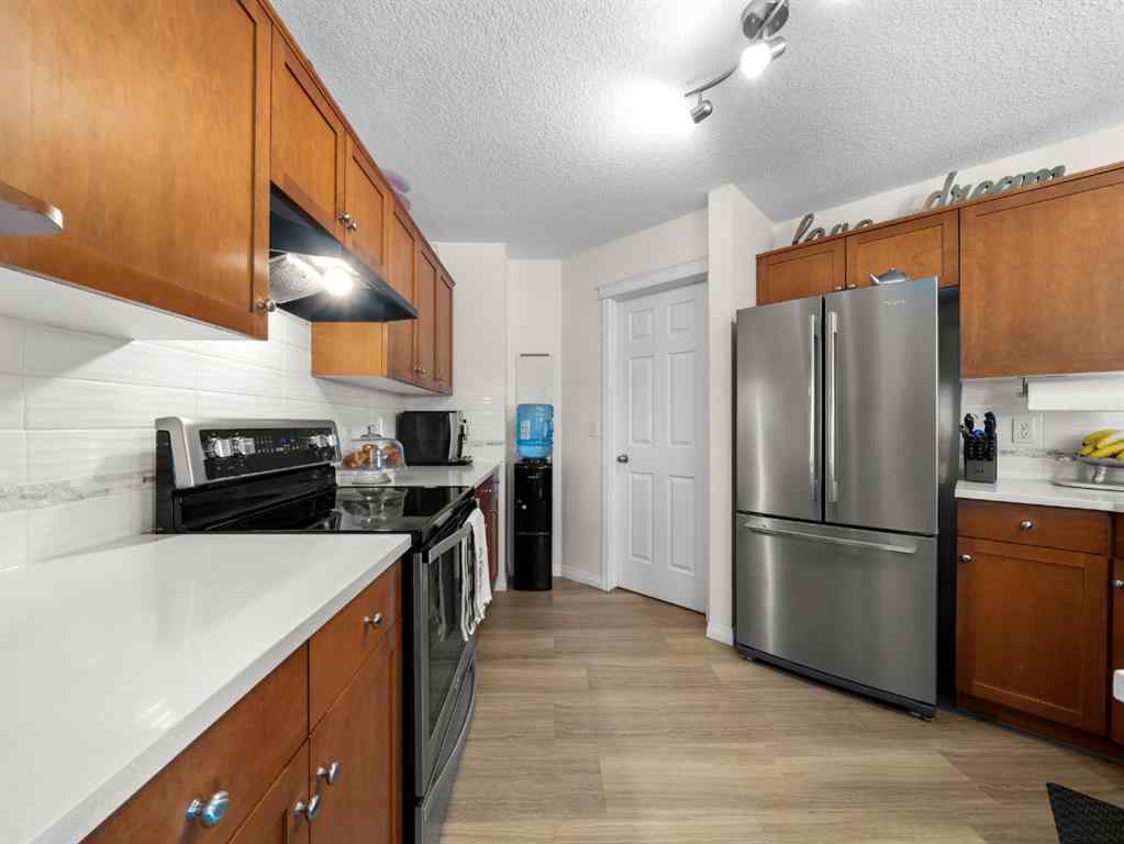 MLS® A2265108 - 97 Evansbrooke Way NW in Evanston Calgary, Residential