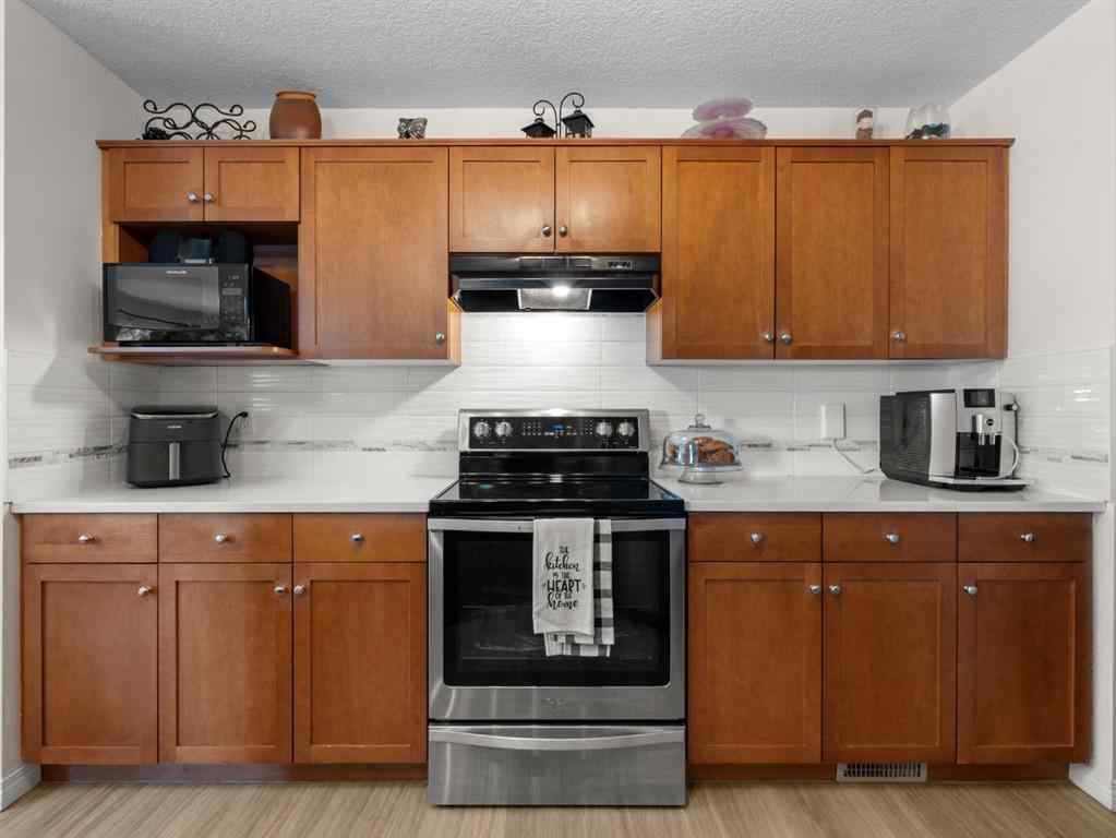 MLS® A2265108 - 97 Evansbrooke Way NW in Evanston Calgary, Residential