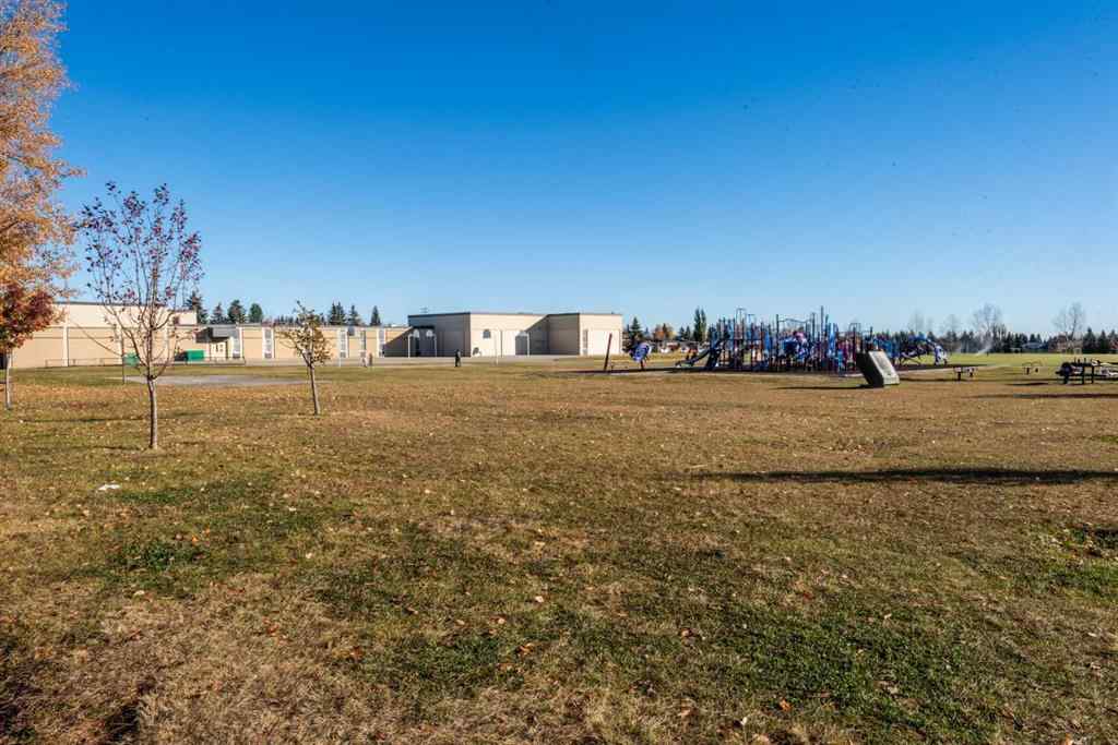 MLS® A2265127 - 66 Cedarwood Lane SW in Cedarbrae Calgary, Residential