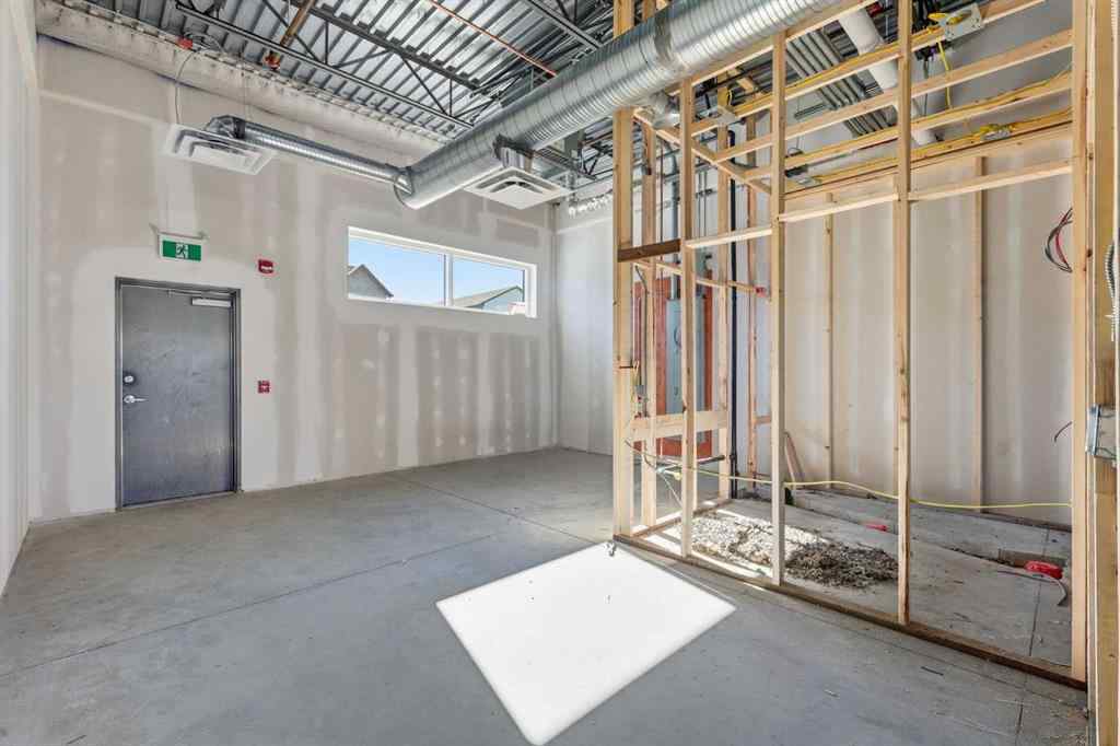 MLS® A2265129 - Unit #1106 20 Dawson Wharf Mount  in Dawson\'s Landing Chestermere, Commercial