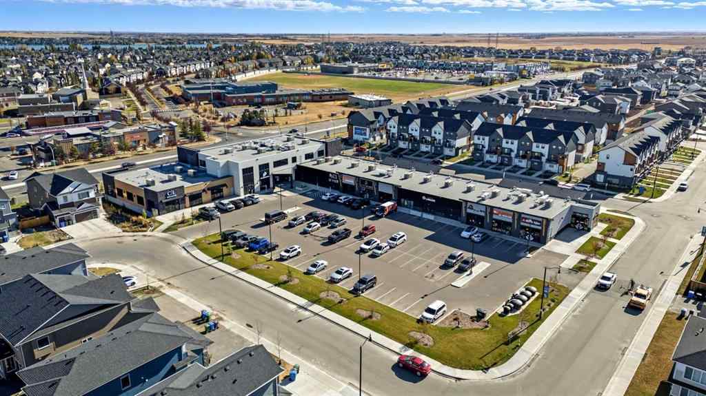 MLS® A2265129 - Unit #1106 20 Dawson Wharf Mount  in Dawson\'s Landing Chestermere, Commercial