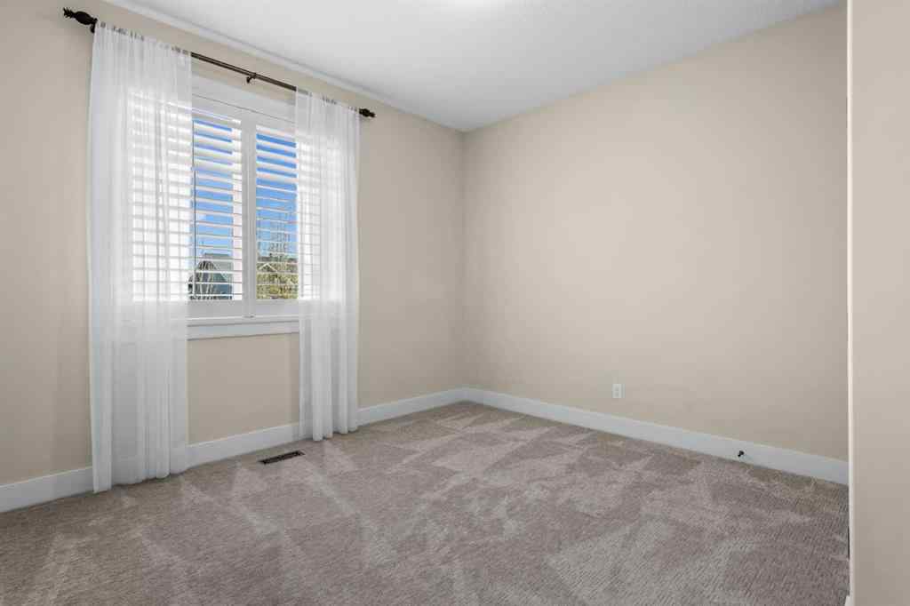 MLS® A2265130 - 10 Cooperstown Court SW in Coopers Crossing Airdrie, Residential