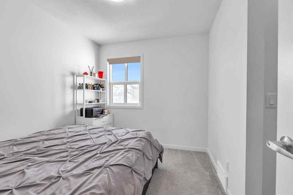 MLS® A2265136 - 52 Edith Gate NW in Glacier Ridge Calgary, Residential