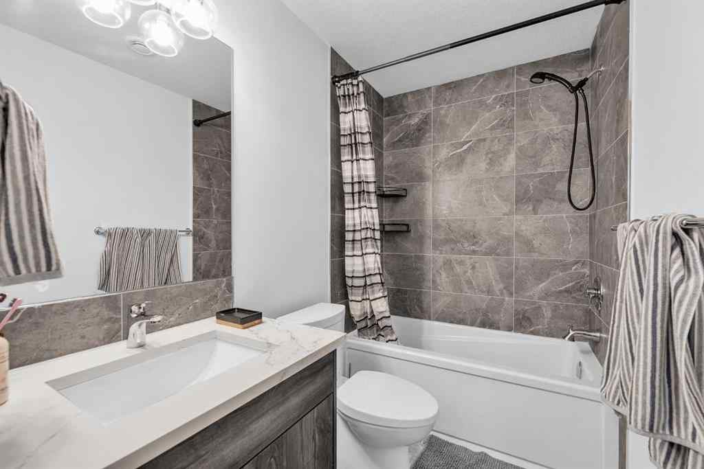 MLS® A2265136 - 52 Edith Gate NW in Glacier Ridge Calgary, Residential
