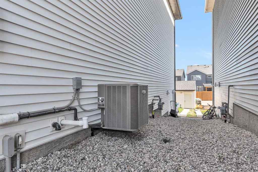 MLS® A2265136 - 52 Edith Gate NW in Glacier Ridge Calgary, Residential