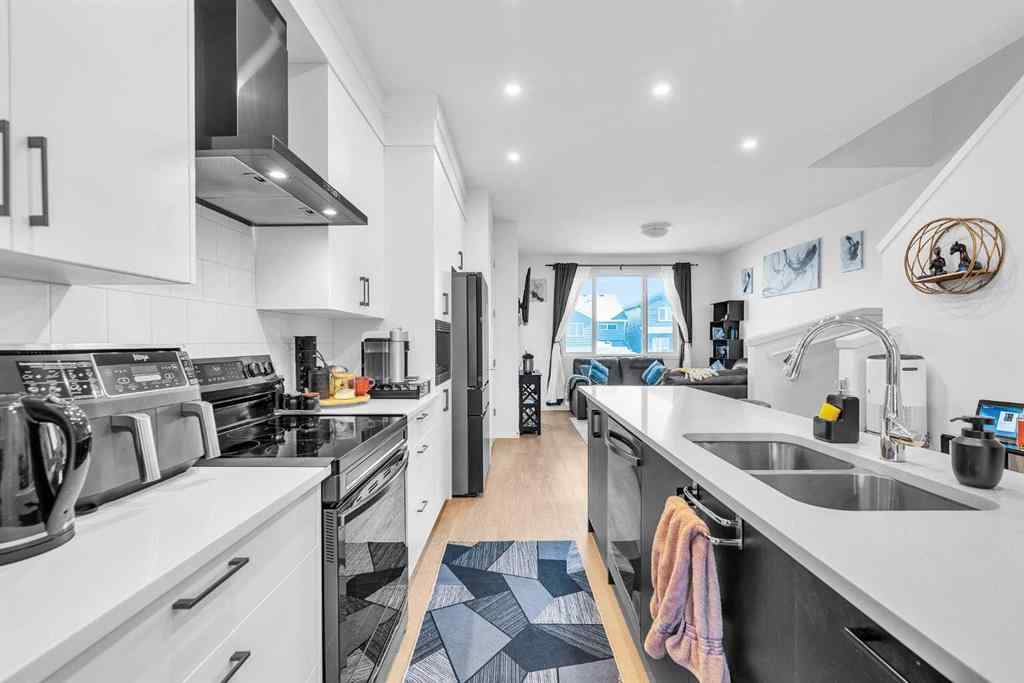 MLS® A2265136 - 52 Edith Gate NW in Glacier Ridge Calgary, Residential