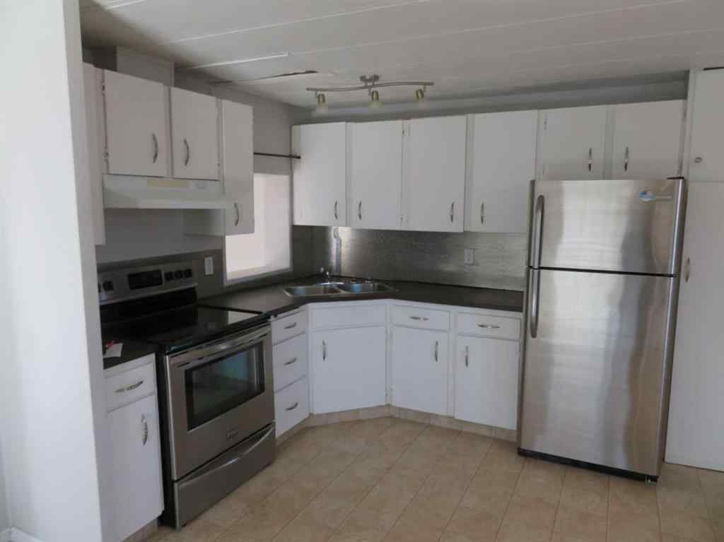 MLS® A2265149 - 13 Westwood Court   in Westwood Innisfail, Mobile