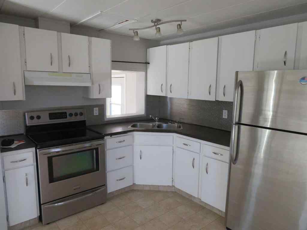 MLS® A2265149 - 13 Westwood Court   in Westwood Innisfail, Mobile