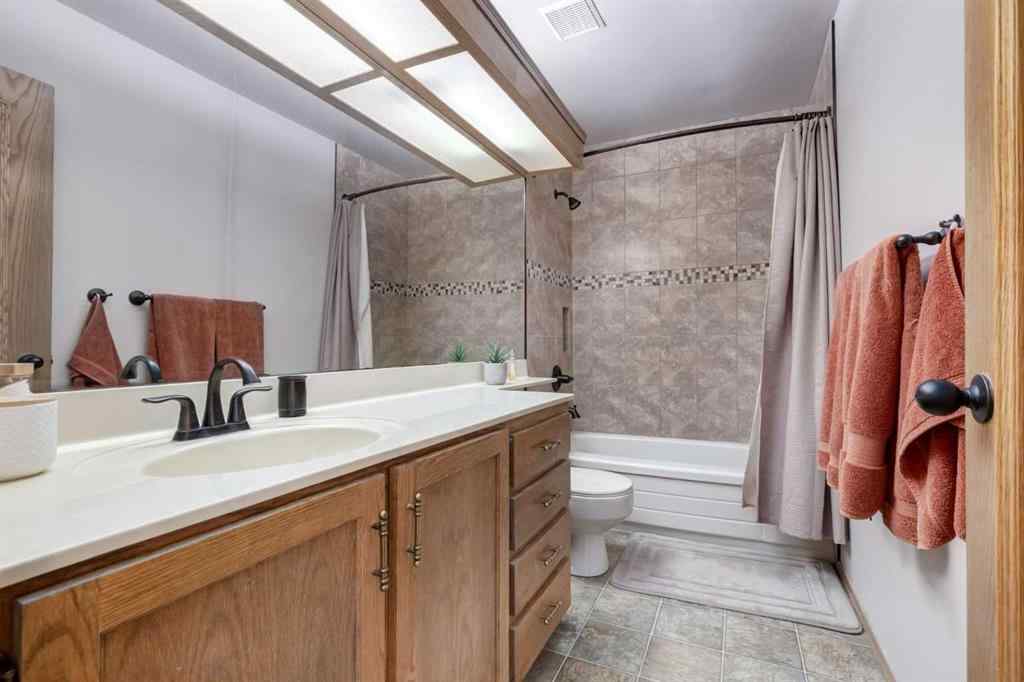 MLS® A2265153 - 39 Canterbury Court SW in Canyon Meadows Calgary, Residential