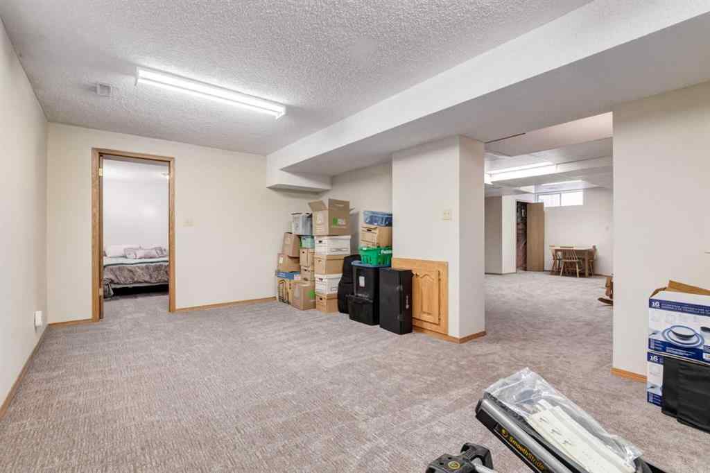 MLS® A2265153 - 39 Canterbury Court SW in Canyon Meadows Calgary, Residential