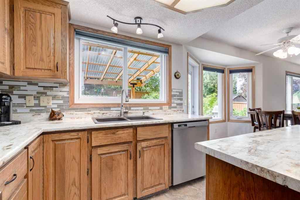 MLS® A2265153 - 39 Canterbury Court SW in Canyon Meadows Calgary, Residential