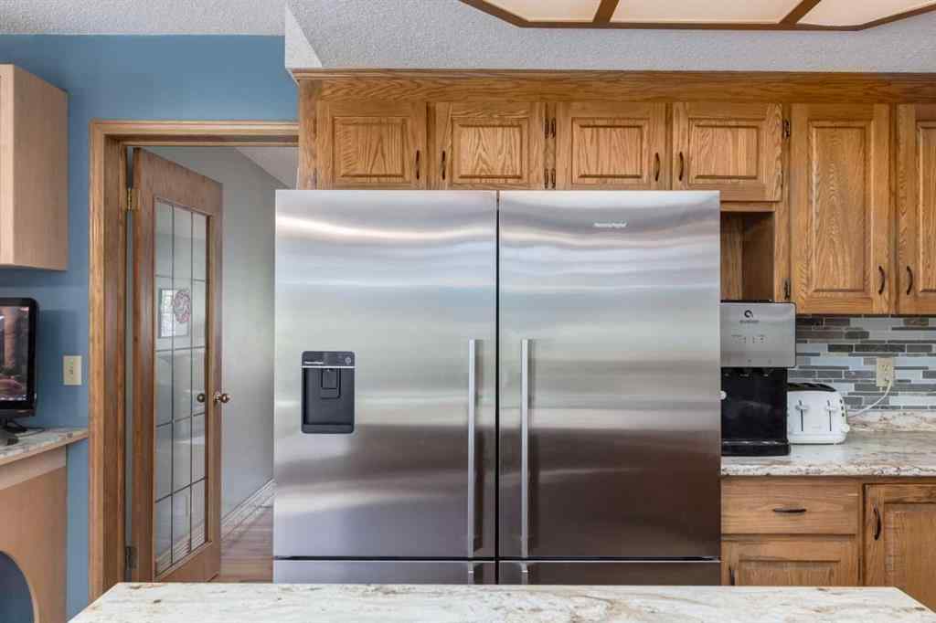 MLS® A2265153 - 39 Canterbury Court SW in Canyon Meadows Calgary, Residential