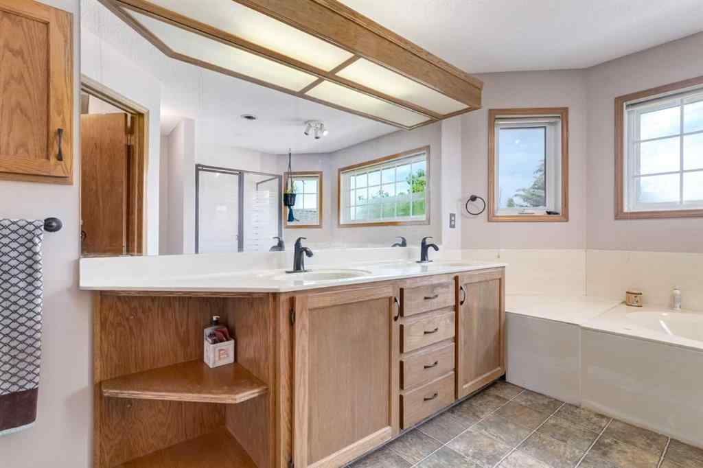 MLS® A2265153 - 39 Canterbury Court SW in Canyon Meadows Calgary, Residential